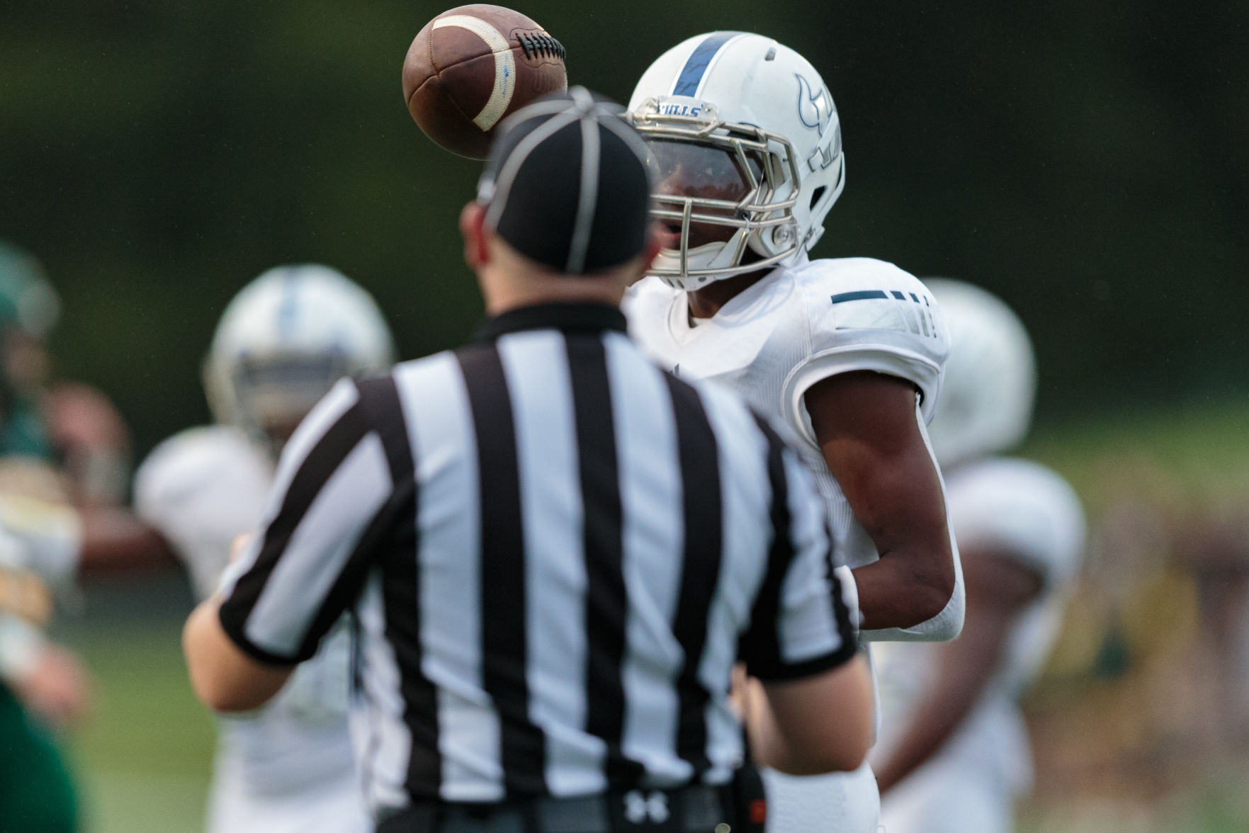 The Ragin' Bulls come from behind in the Battle of the Horns to defeat the Vikings 27-20.